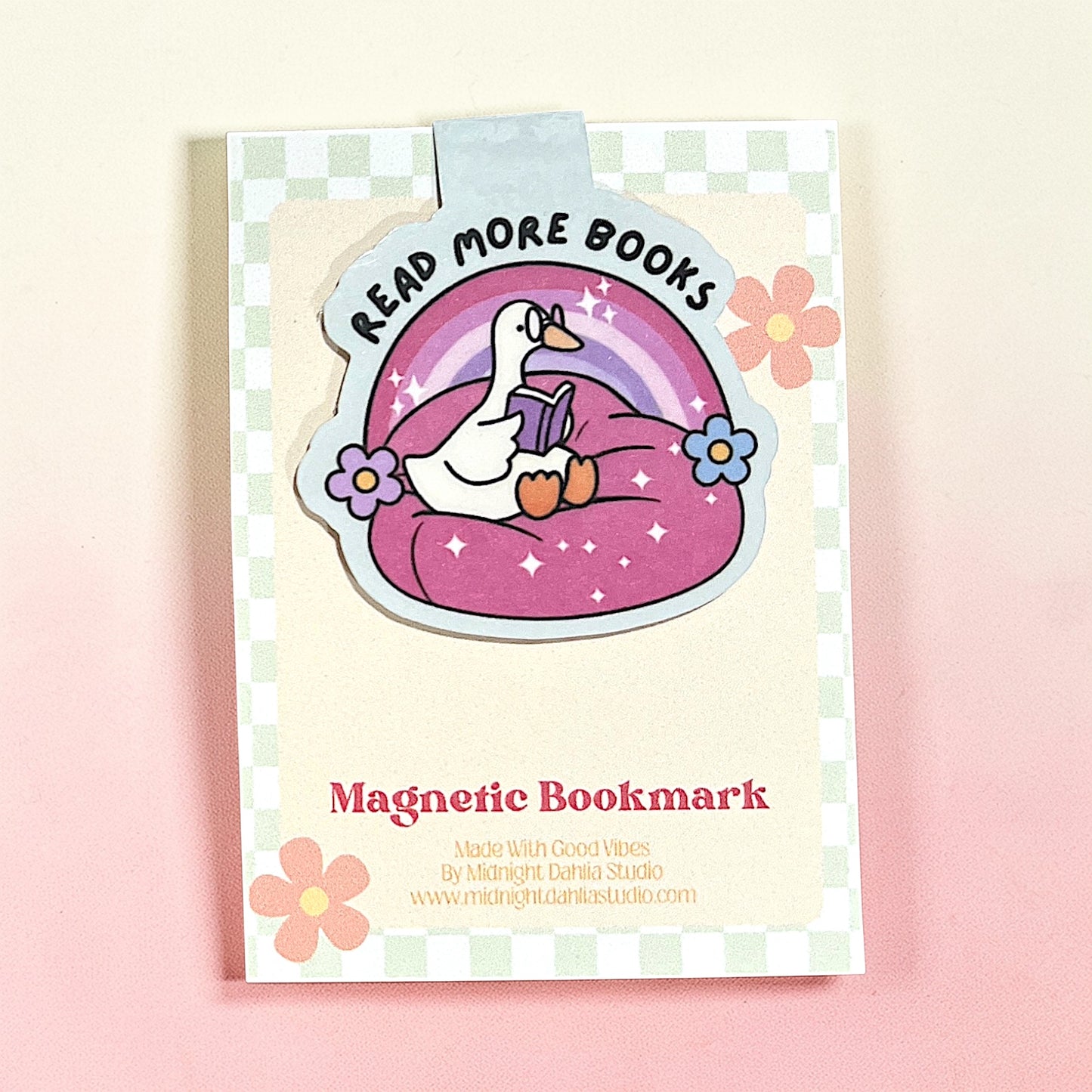 Magnetic bookmark with cartoon duck design on a checkered background
