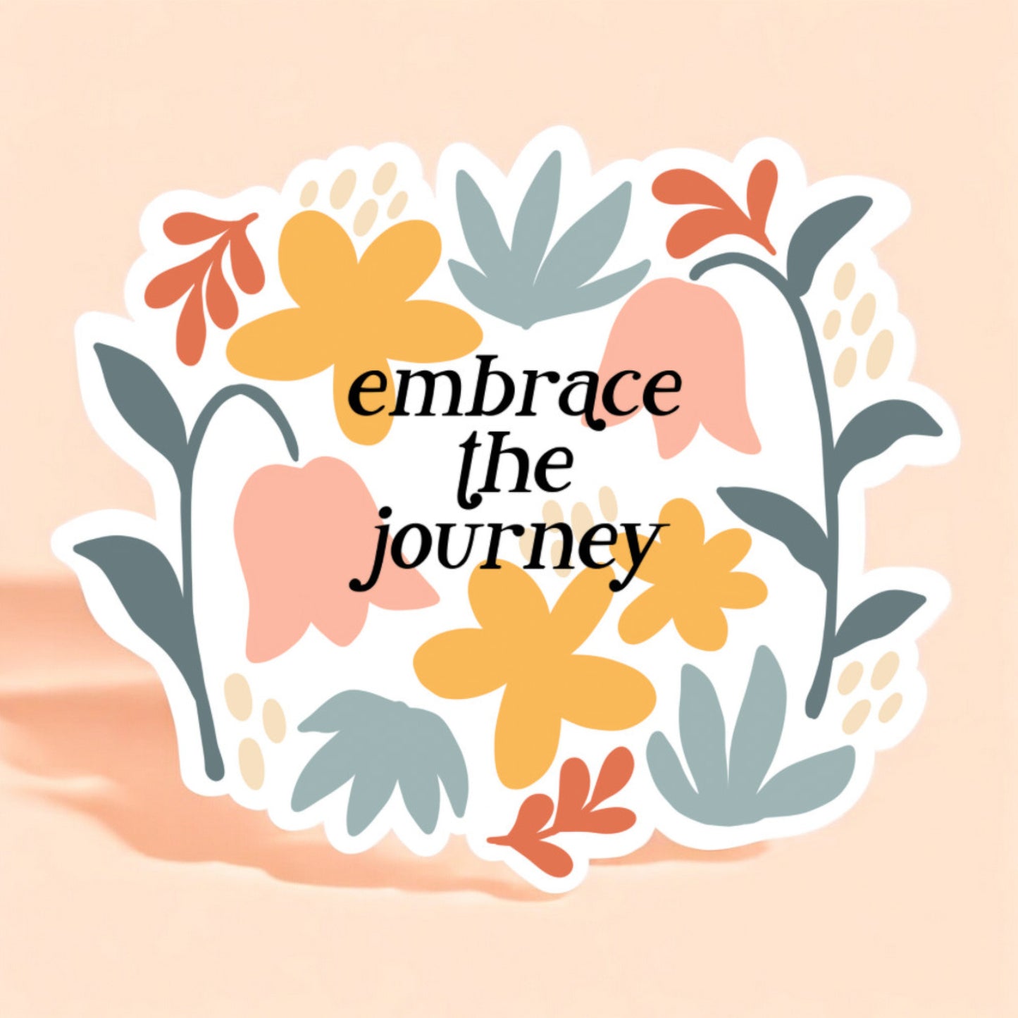 a white background sticker that reads embrace the journey in black in front of artistic floral pattern