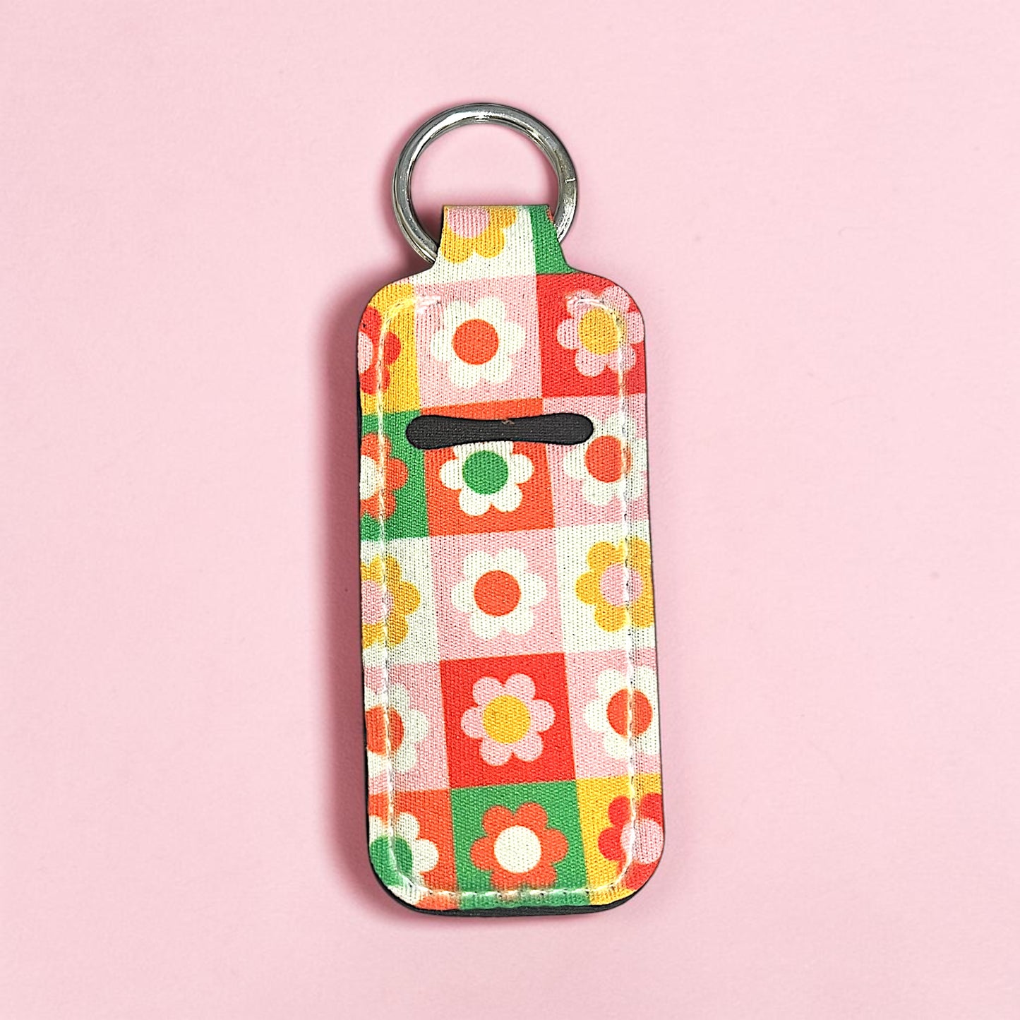Keychain with floral pattern on a pink background