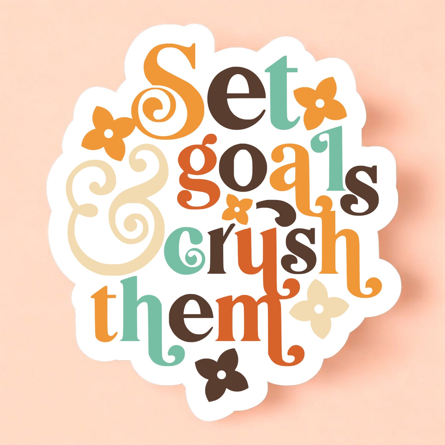 a sticker that reads set goals and crush them in colorful type