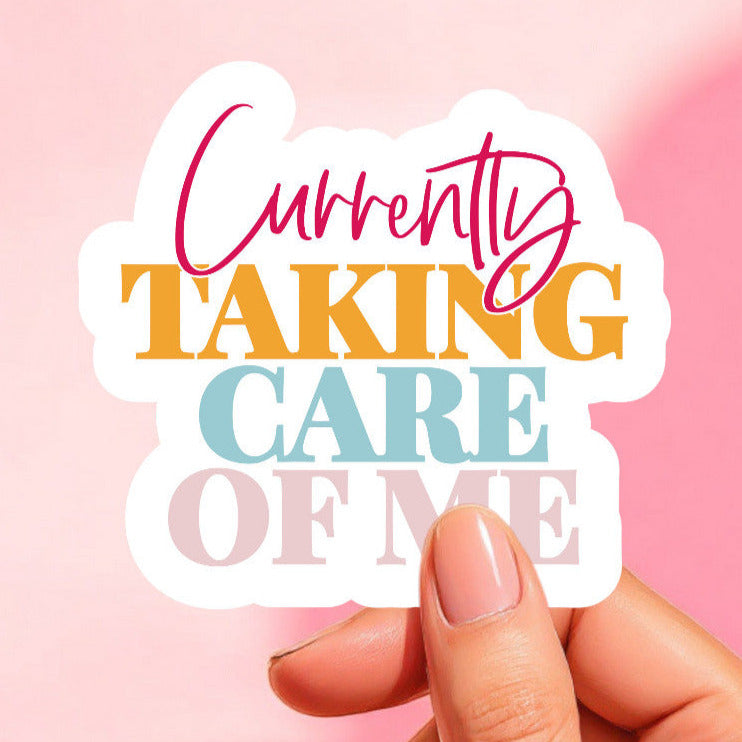 a sticker that reads currently taking care of me