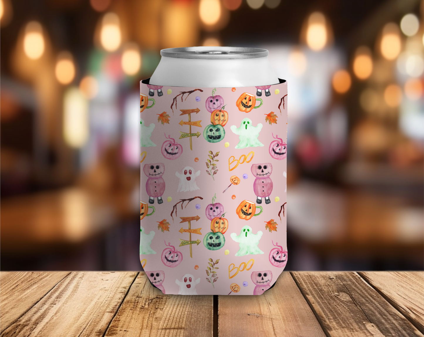 Can with a colorful Halloween-themed design on a wooden table with a blurred background