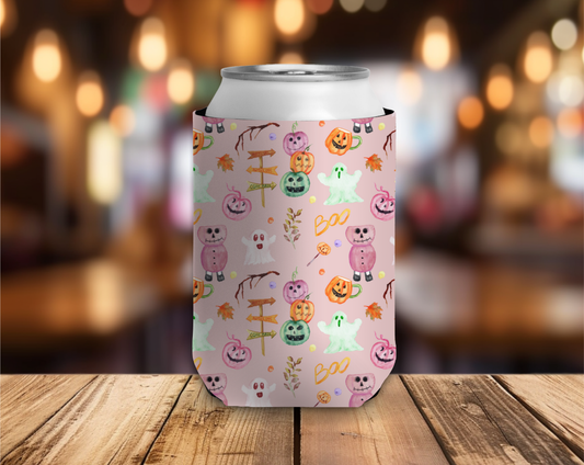 Can with a colorful Halloween-themed design on a wooden table with a blurred background