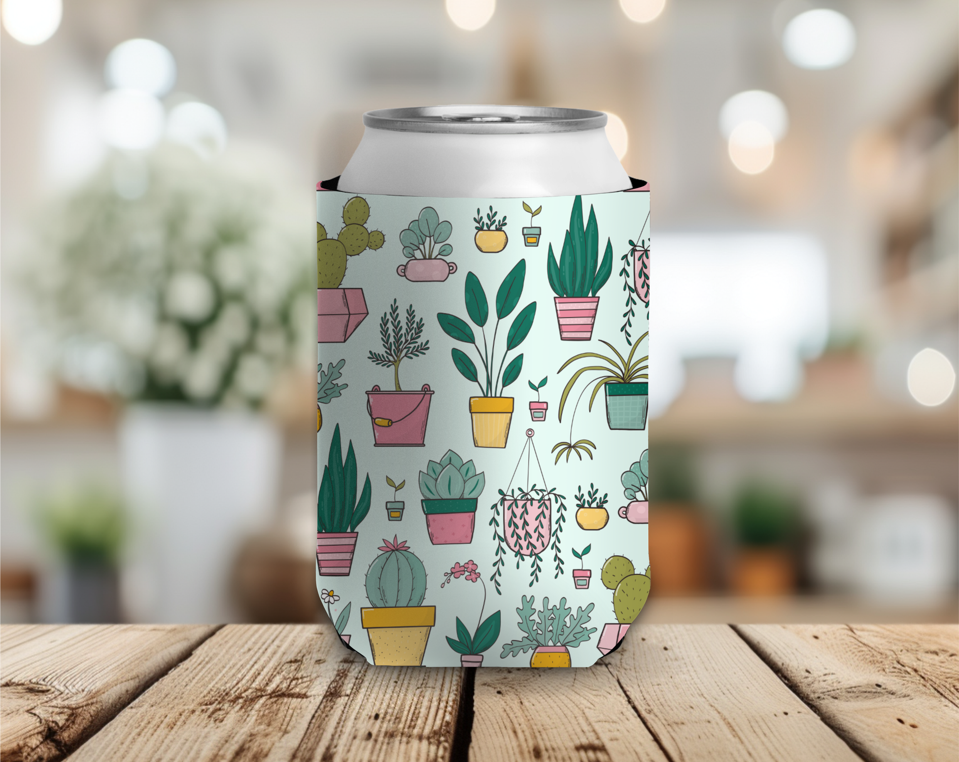 Can cooler with plant pattern on a wooden table
