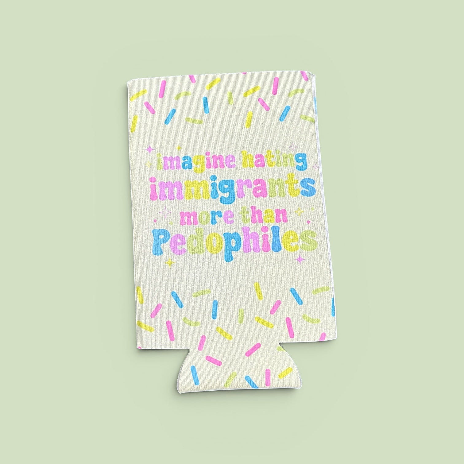 a light green can cooler that reads 'imagine hating immigrants more than pedophiles' with colorful illustrated sprinkles