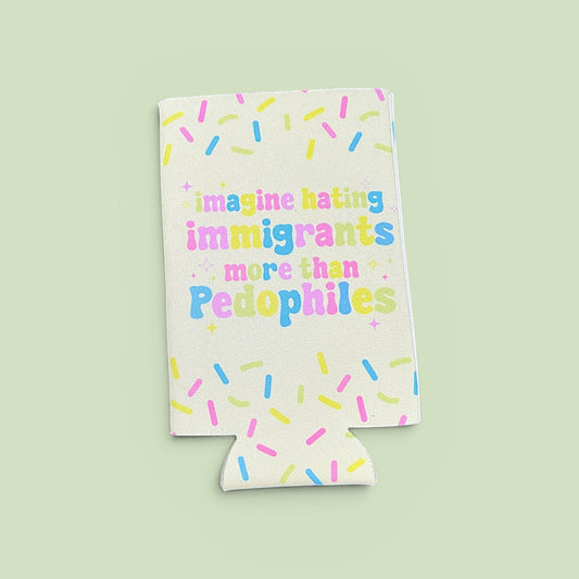 a light green can cooler that reads 'imagine hating immigrants more than pedophiles' with colorful illustrated sprinkles