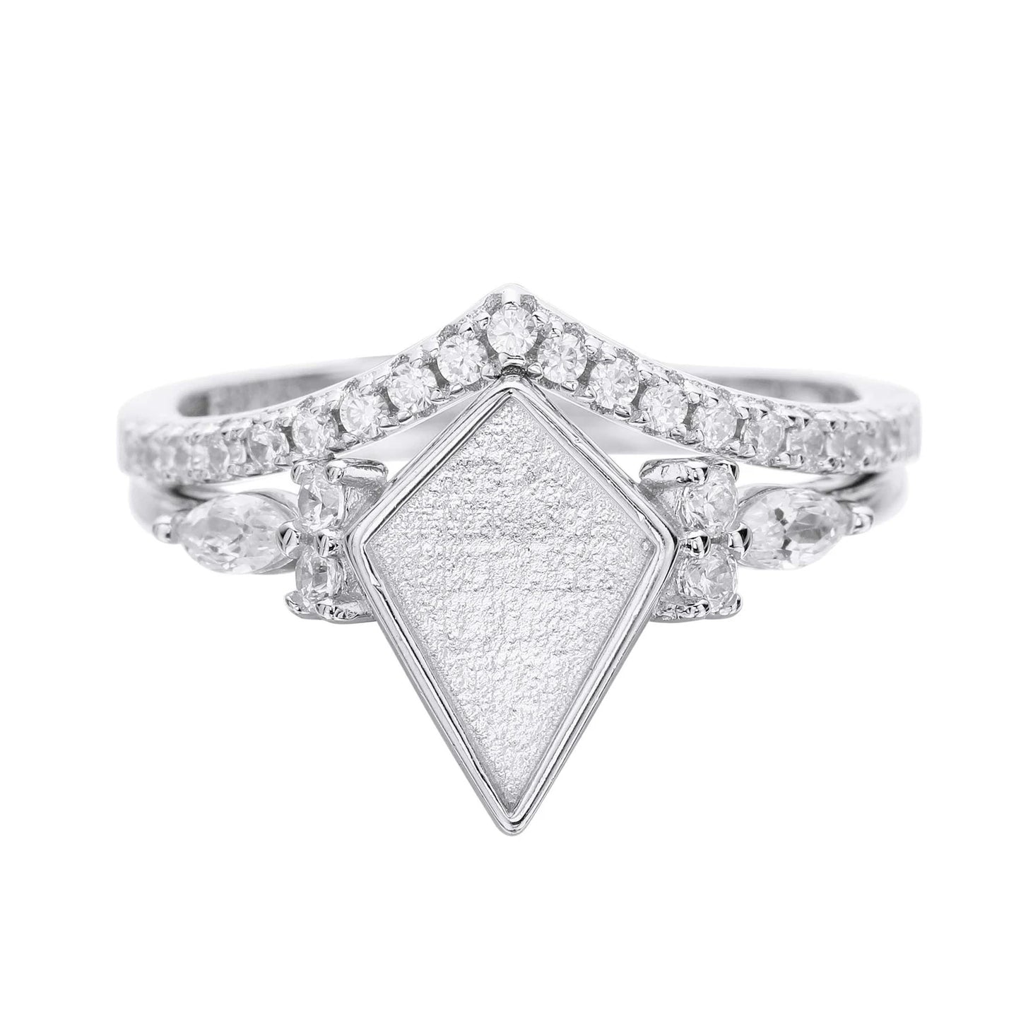 Diamond ring with a textured diamond-shaped center on a white background