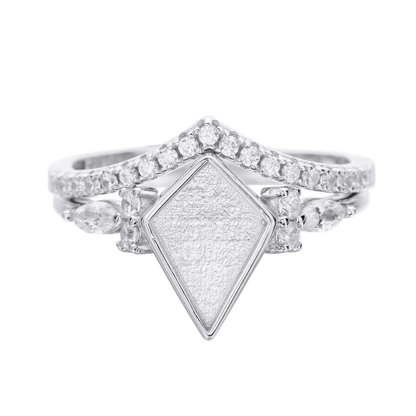 Diamond ring with a textured diamond-shaped center on a white background