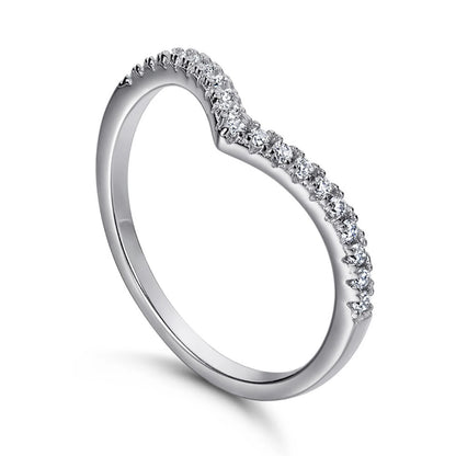 Silver ring with small diamonds on a white background