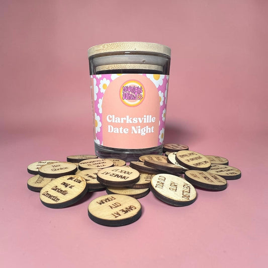Jar labeled 'Clarksville Date Night' with wooden tokens on a pink background