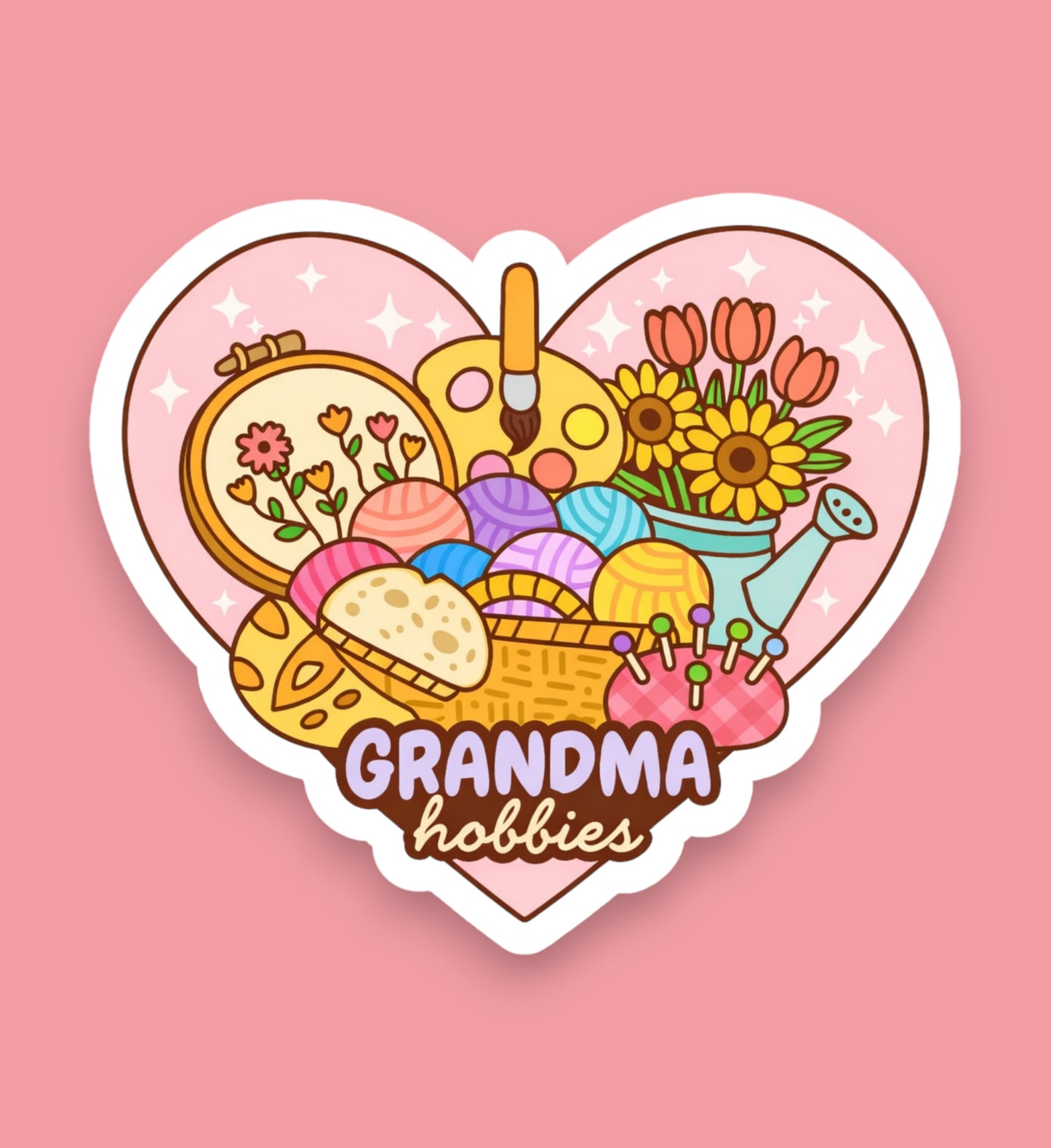 Heart-shaped sticker with various hobbies items and 'Grandma hobbies' text on a pink background