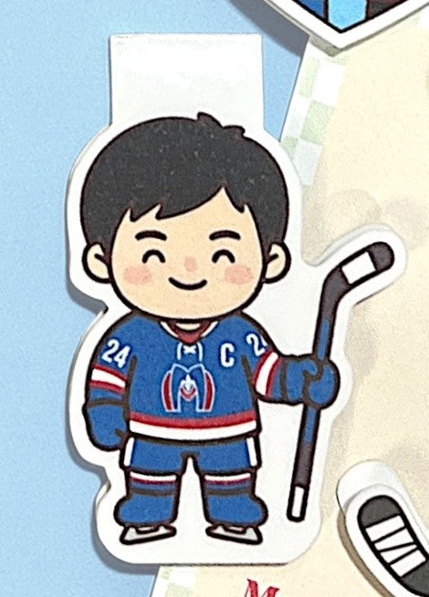 Sticker of a hockey player in a blue jersey with a stick on a light blue background