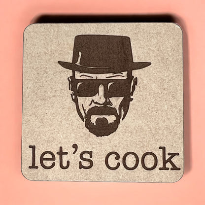 A square magnet with a humorous quote printed on it, placed against a pink background.