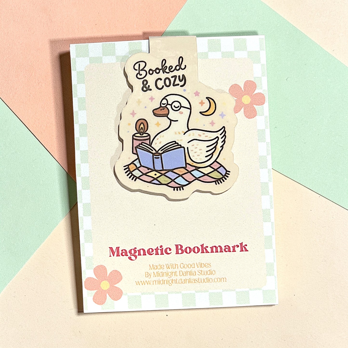 Magnetic bookmark with duck illustration on a colorful geometric background