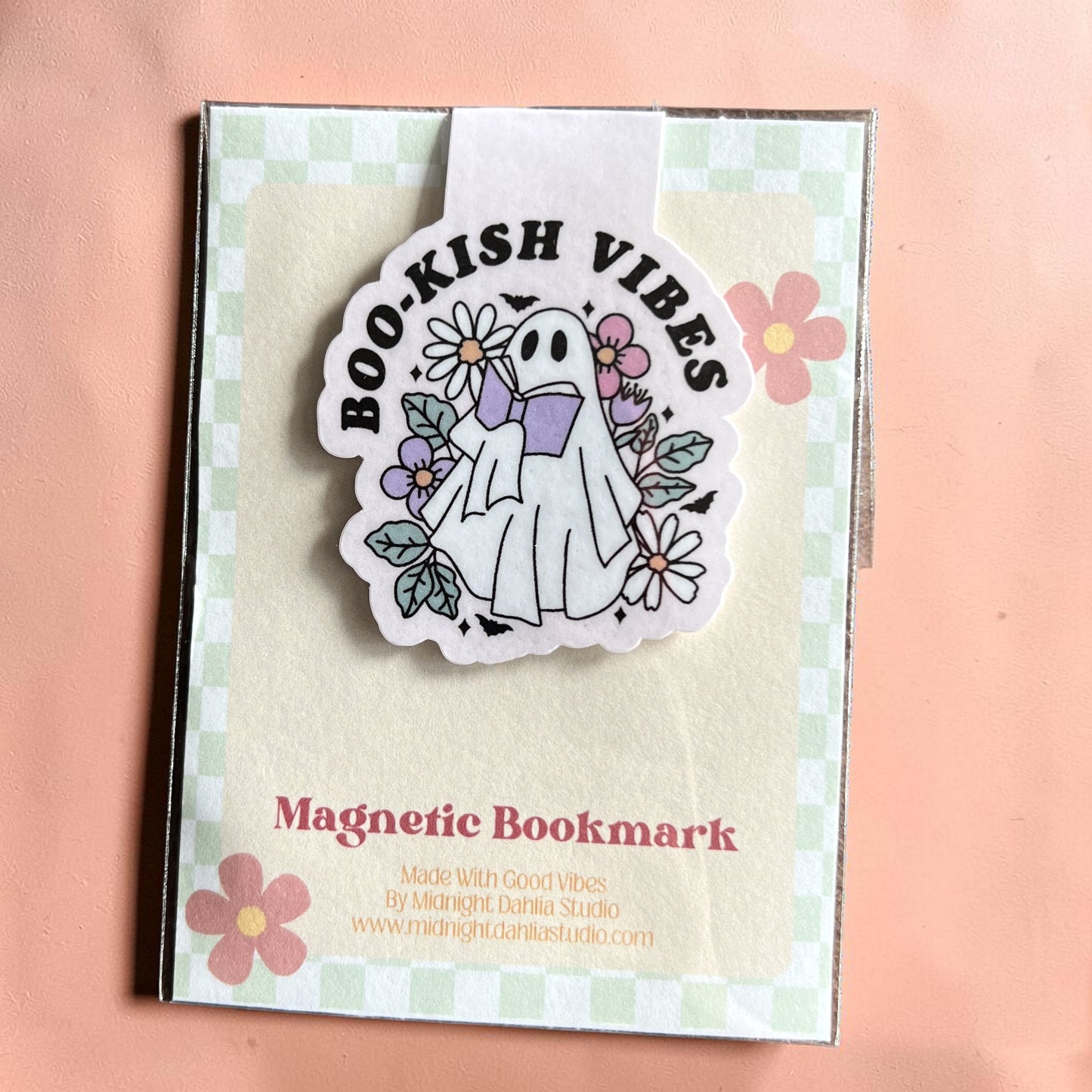 Magnetic bookmark with ghost design and 'Boo-kish Vibes' text on a checkered background