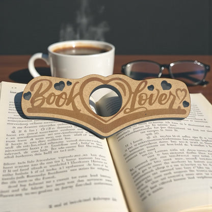 Wooden 'Book Lover' glasses holder on an open book with a cup of coffee and glasses in the background.