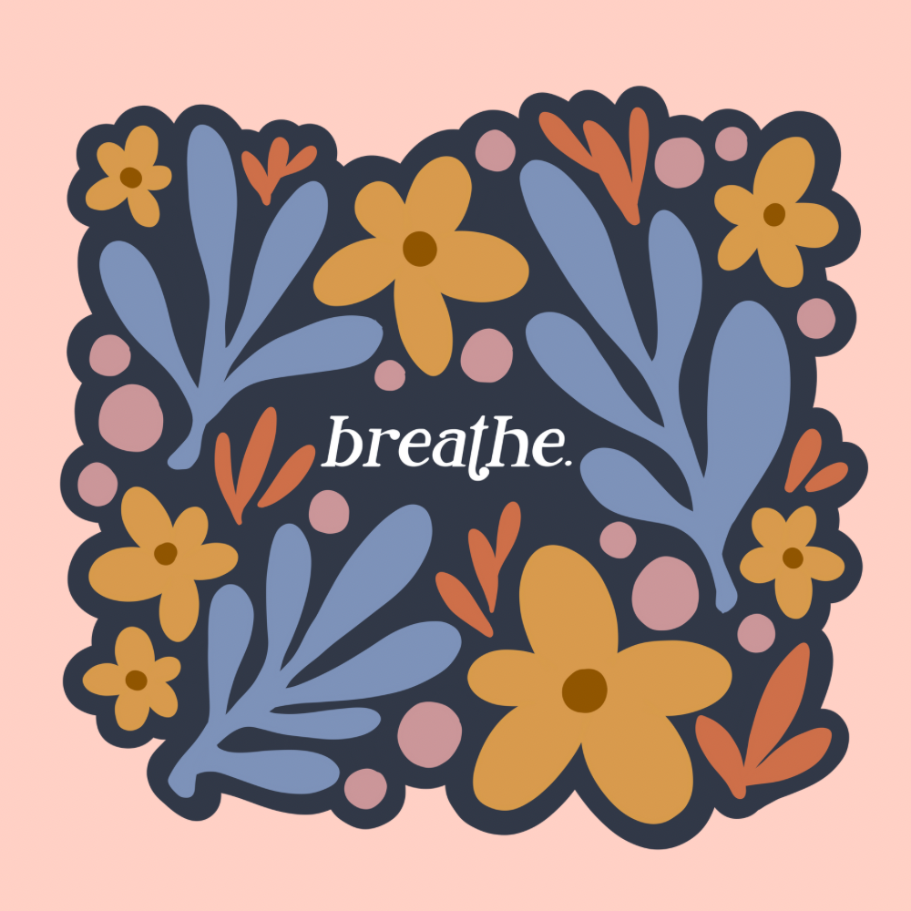 a sticker with a navy blue background and colorful flowers that reads breathe