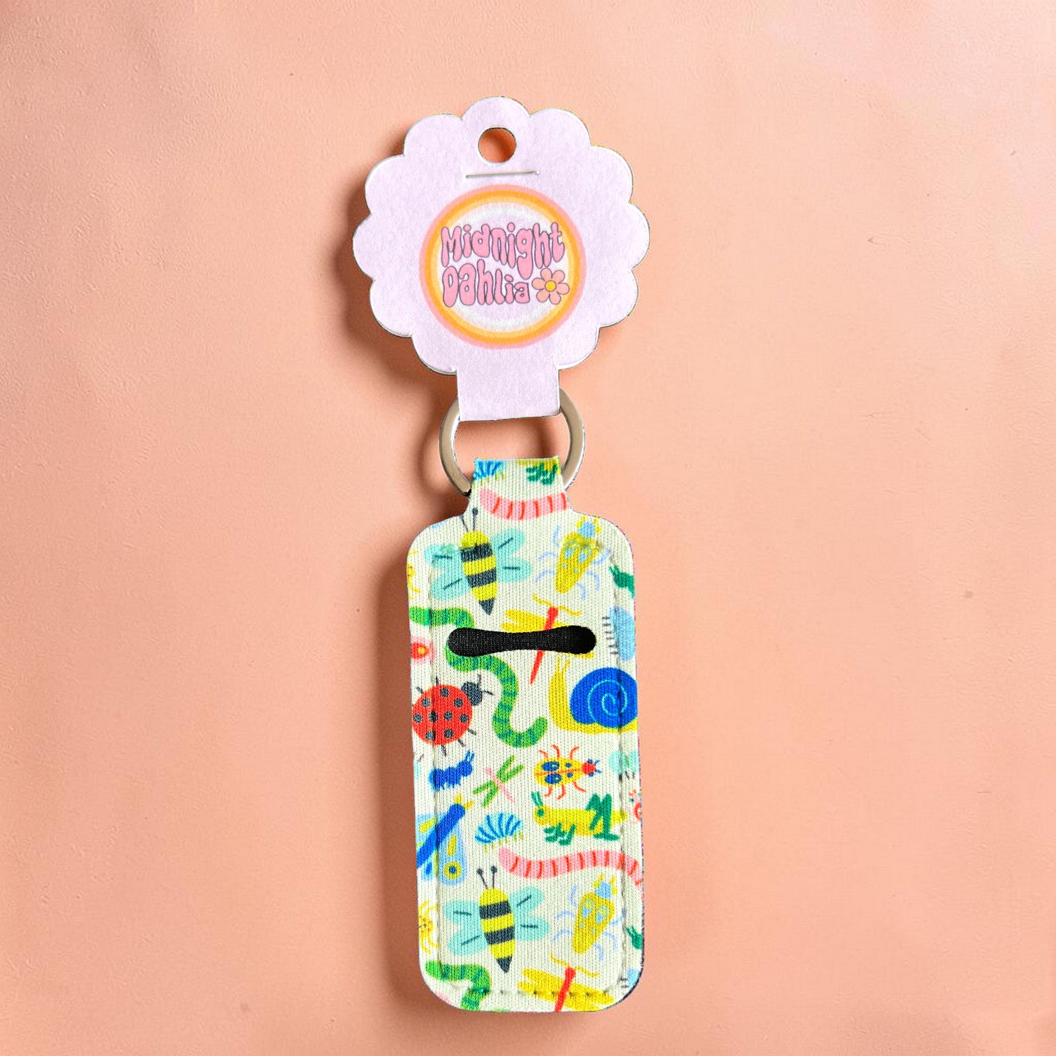 Colorful keychain with animal pattern on a beige background