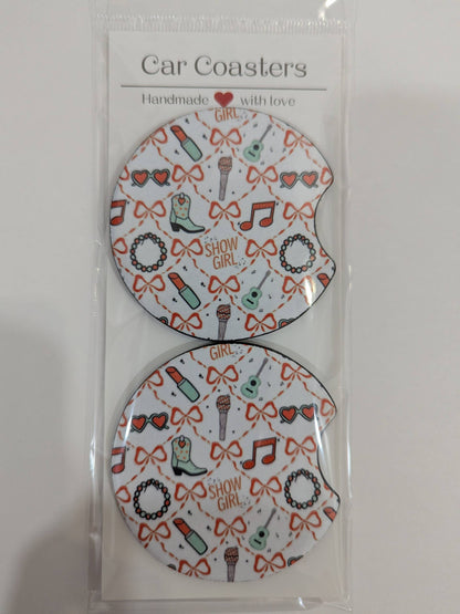 Packaged car coasters with 'Girl' theme design on a white background