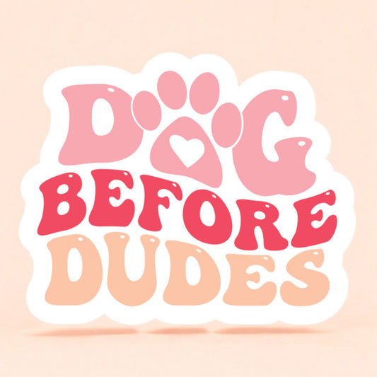 a white background sticker with dog before dudes printed in light pale pink, bright reddish pink, and a peach orange color