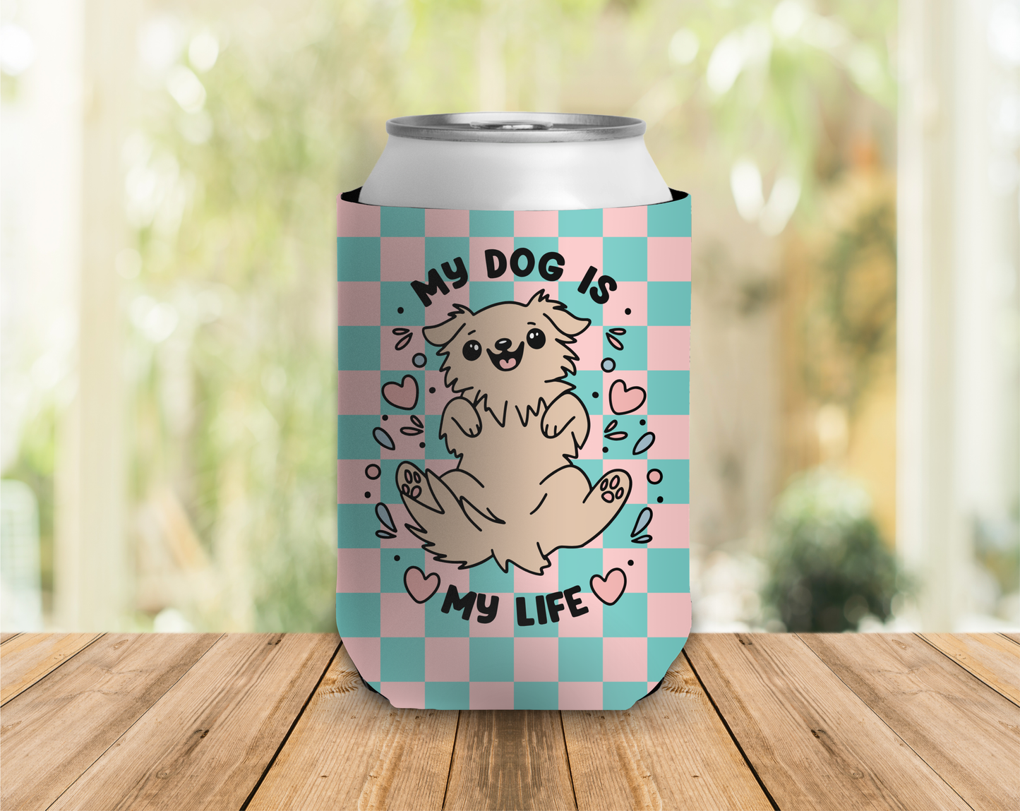 a checkered can cooler that reads 'my dog is my life' with a cartoon golden dog in the center surrounded by hearts