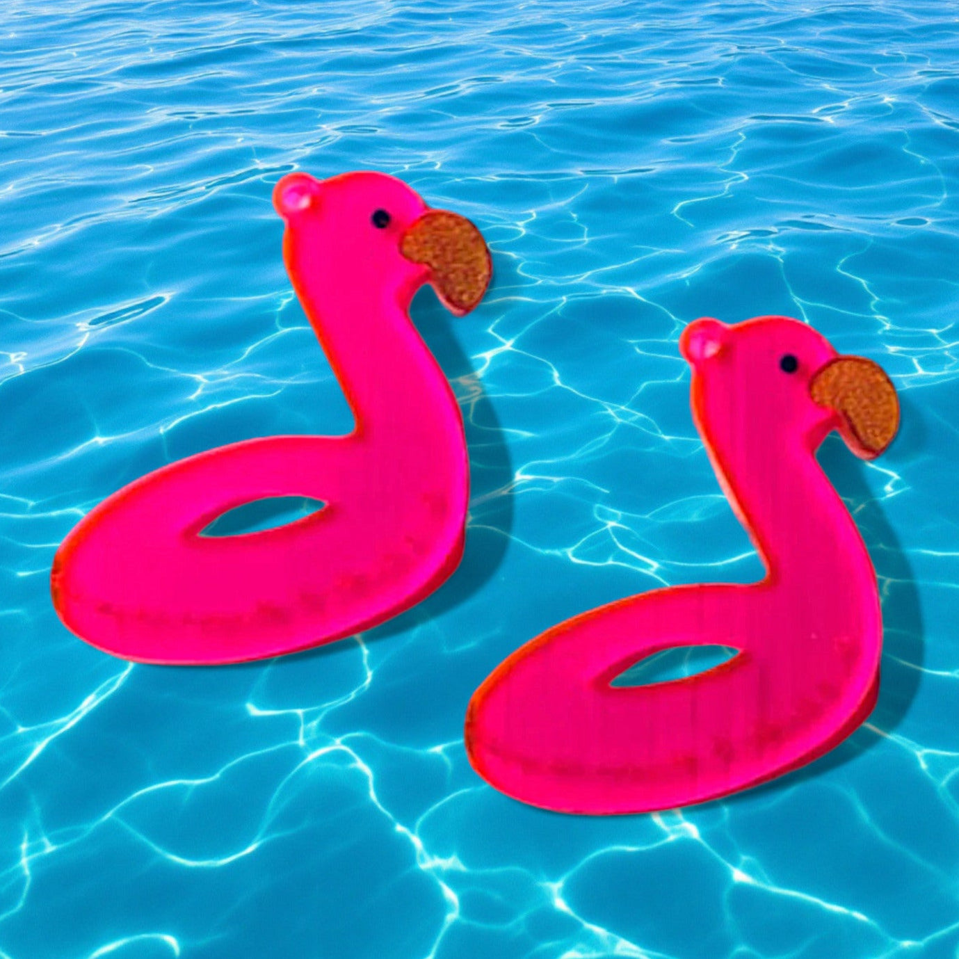 Cute hot pink translucent neon flamingo floaty floatie earring.  A nostalgic gift for a woman or teen.