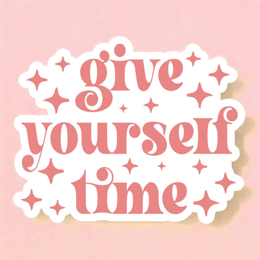 a white sticker that reads give yourself time in a light coral pink surrounded by retro 4 point stars