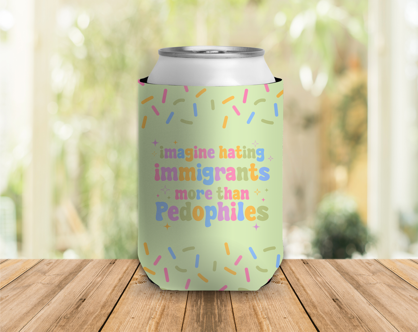a can cooler in light green that reads 'imagine hating immigrants more than pedophiles'