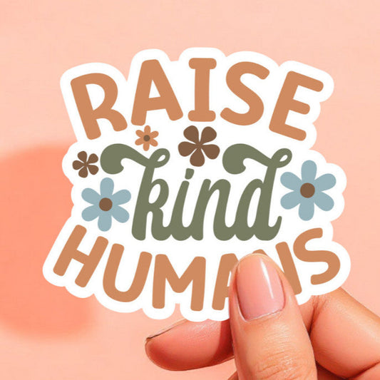 a retro style sticker that reads raise kind humans with daisies