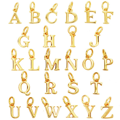 Gold letter pendants from A to Z on a white background
