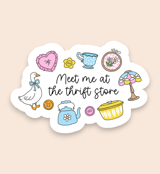 Sticker with various illustrations and text 'Meet me at the thrift store' on a beige background