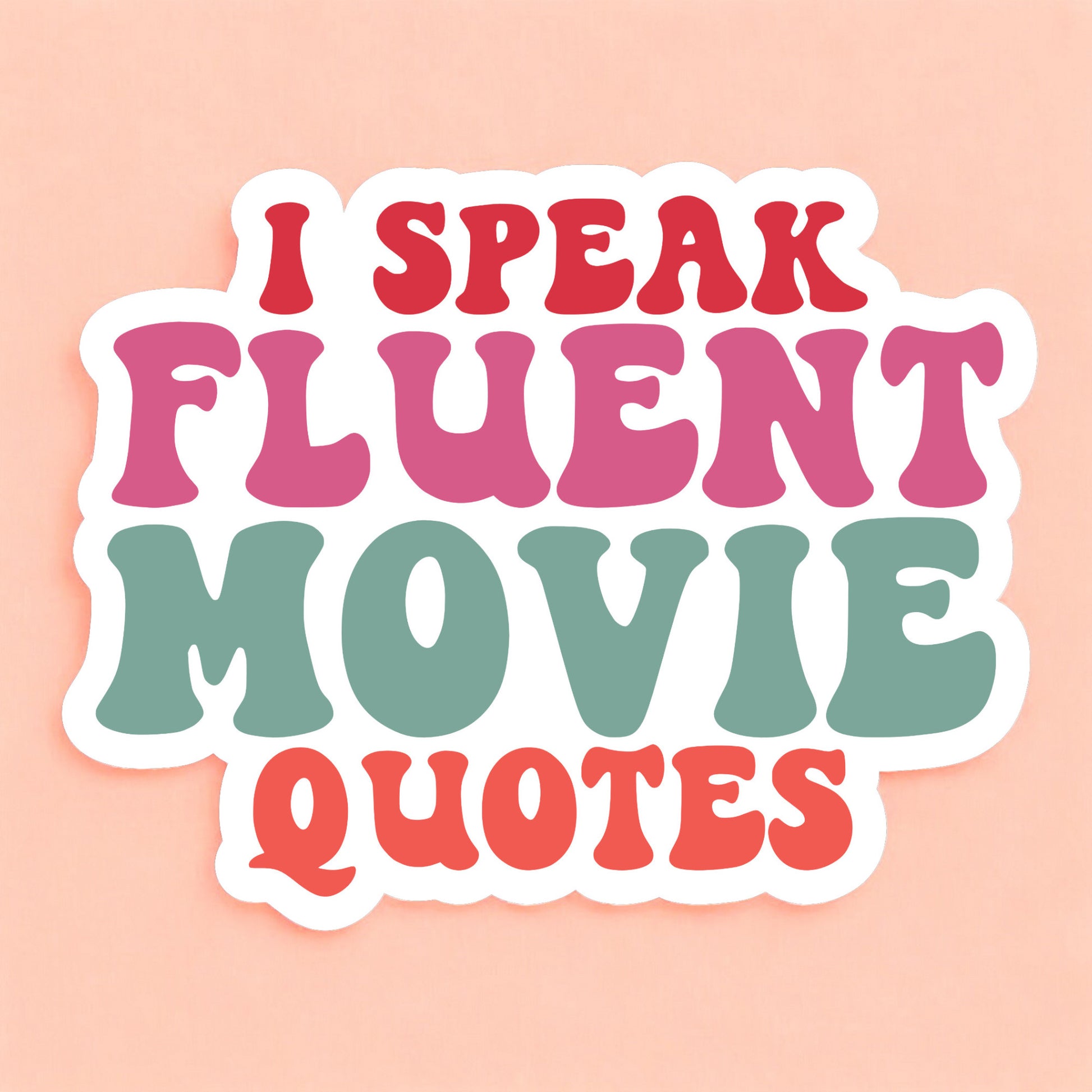 a white sticker that reads I speak fluent movie quotes in red, pink, green, and orange