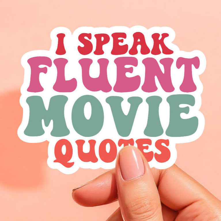 a white sticker that reads I speak fluent movie quotes in red, pink, green, and orange