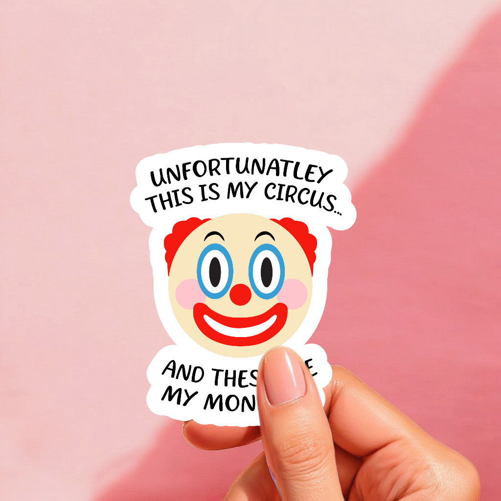 A sticker with an illustration of a clown's face with the text 'UNFORTUNATELY THIS IS MY CIRCUS.