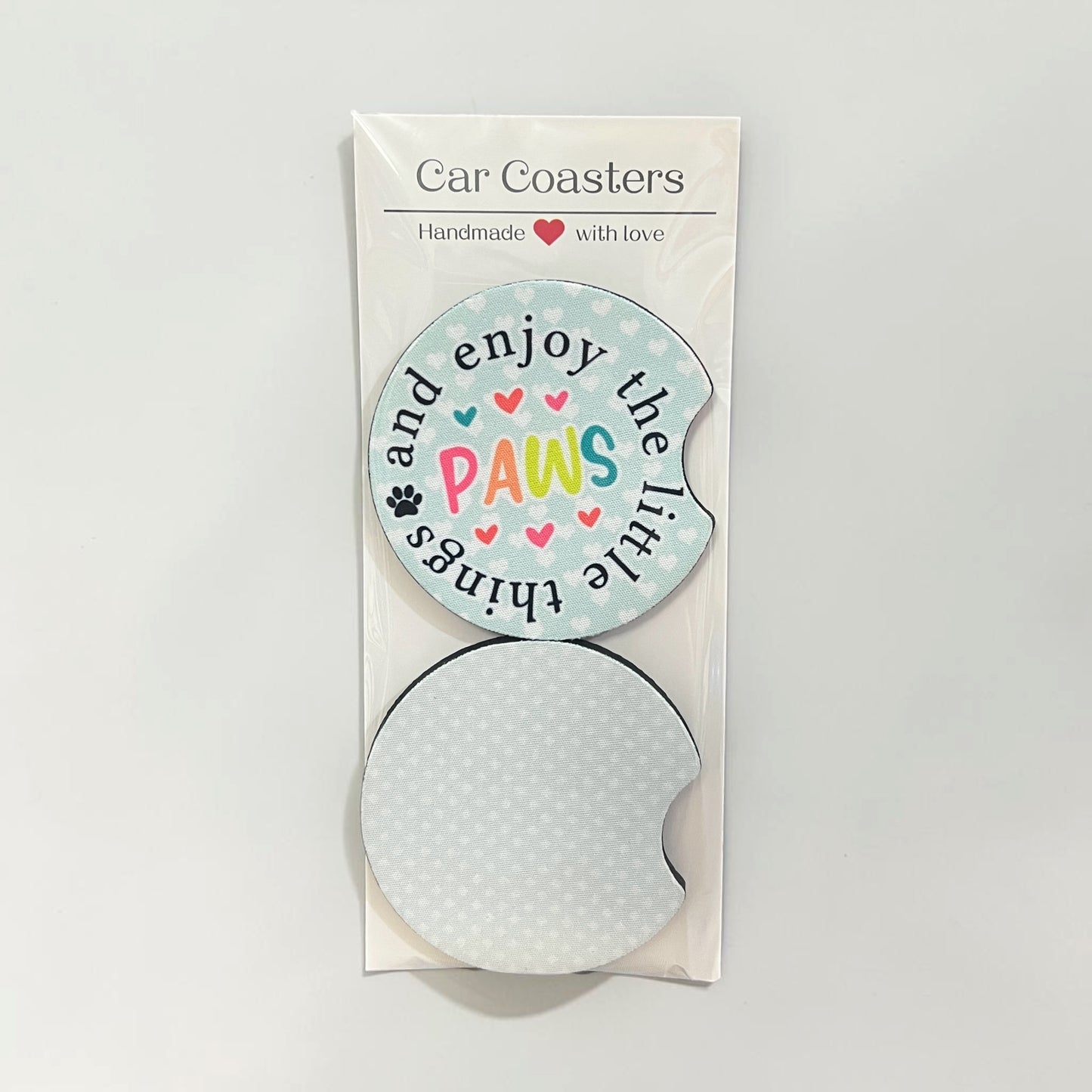 Car coaster set with a decorative label on a white background