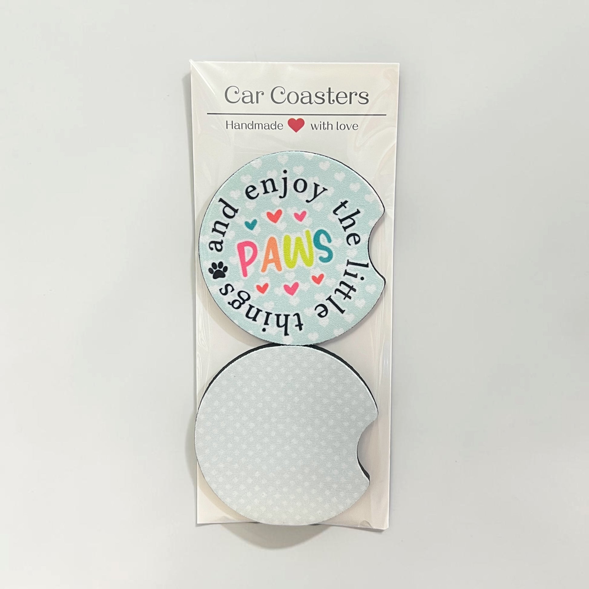 Car coaster set with a decorative label on a white background