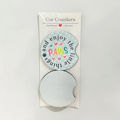 Car coaster set with a decorative label on a white background