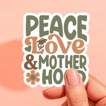 a retro style sticker that reads peace love and motherhood