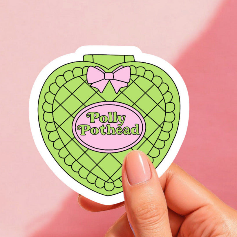A colorful sticker with a baked cake design, predominantly green, with the text 'Polly Pothead' displayed in the center.