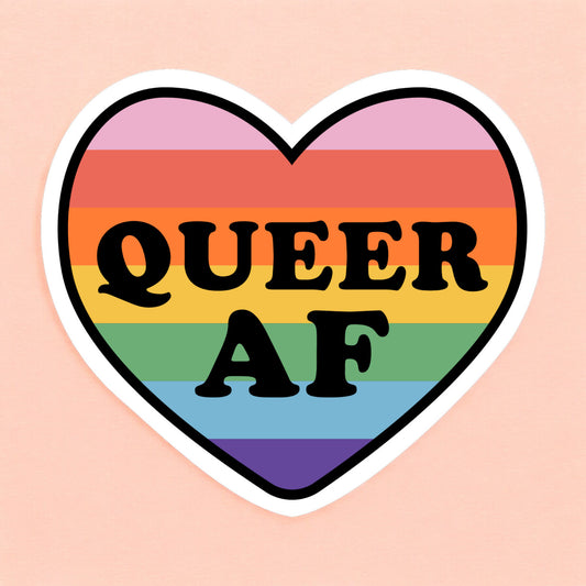 a heart shaped sticker with a rainbow in the background that reads Queer AF