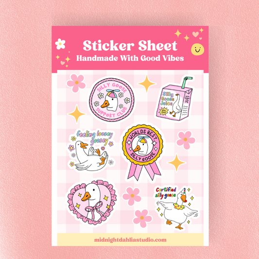 Sticker sheet with cartoon duck designs on a pink background