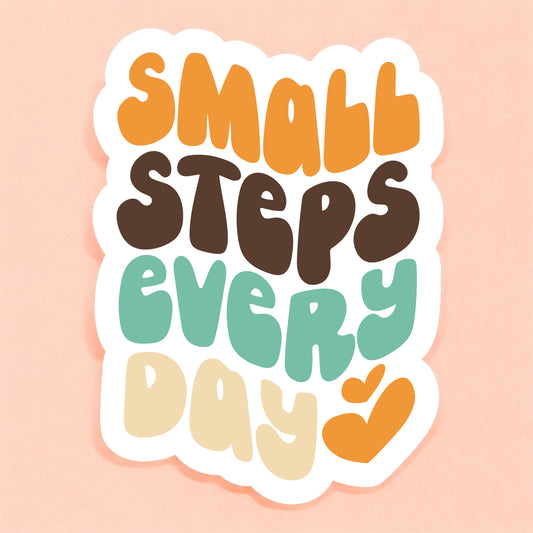a white sticker that reads small steps every day in a bubble retro font in mustard yellow, brown, teal, and pale yellow