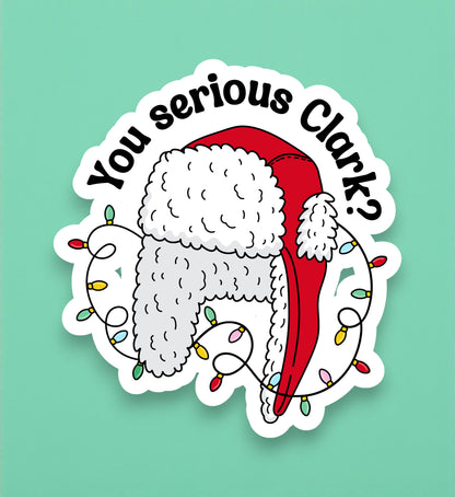Sticker with a Santa hat and text 'You serious Clark?' on a light green background
