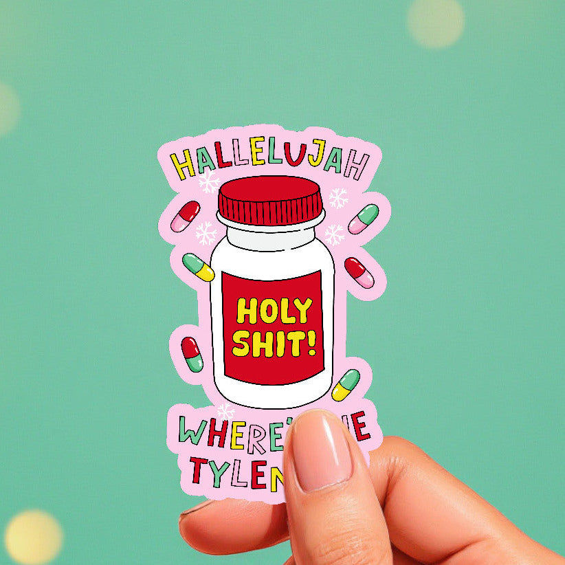 Sticker with text and a pill bottle design held by a hand against a green background
