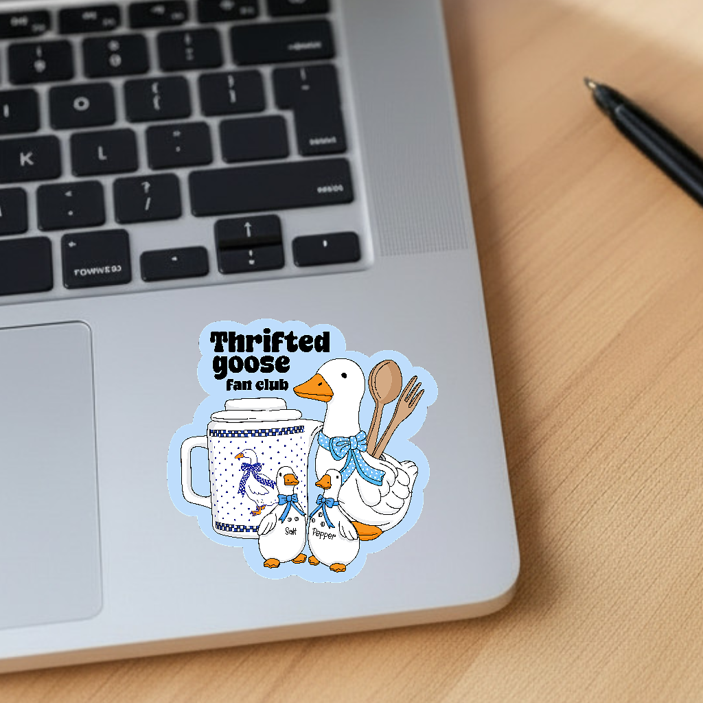 Sticker with 'Thrifted Goose Fan Club' design on a laptop