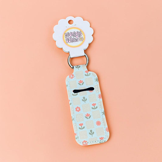 Keychain with floral pattern on a pink background