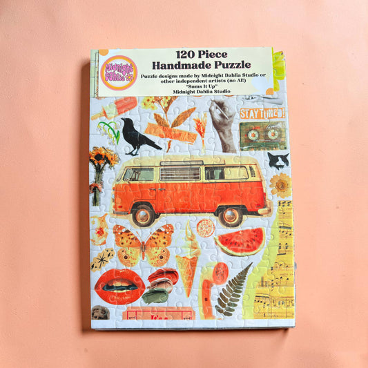 120 piece handmade puzzle packaging with a vintage van design on a pink background